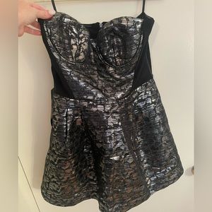 Bebe strapless cocktail dress in black and silver